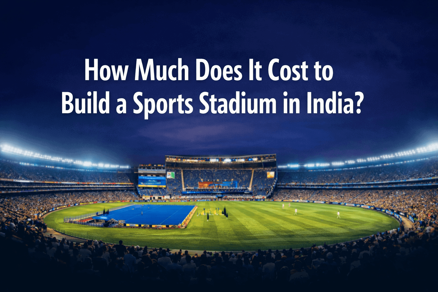 A wide-angle view of a crowded, brightly lit sports stadium at night in India, featuring a green field and a blue rectangular court in the center, with the text "How Much Does It Cost to Build a Sports Stadium in India?" overlaying the sky.